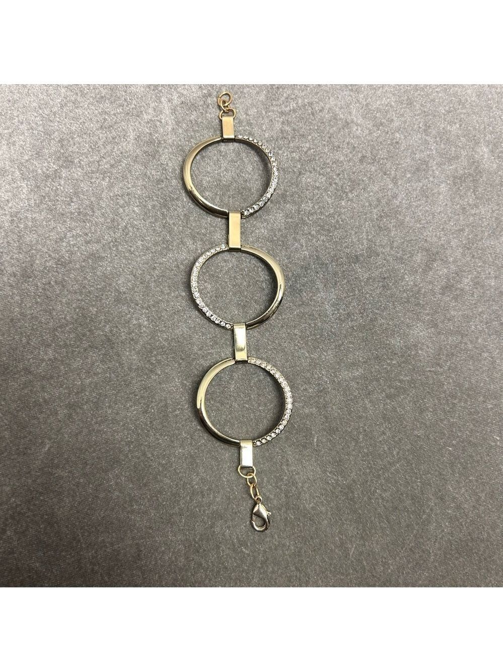Guess gold-tone circular link crystal rhinestone bracelet